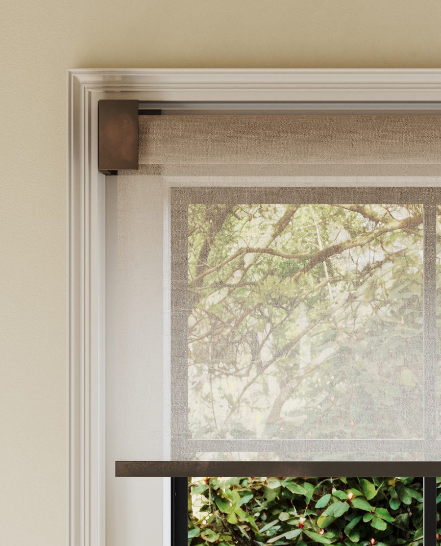 Close-up of mechanism-hiding corner brackets on designer roller blind