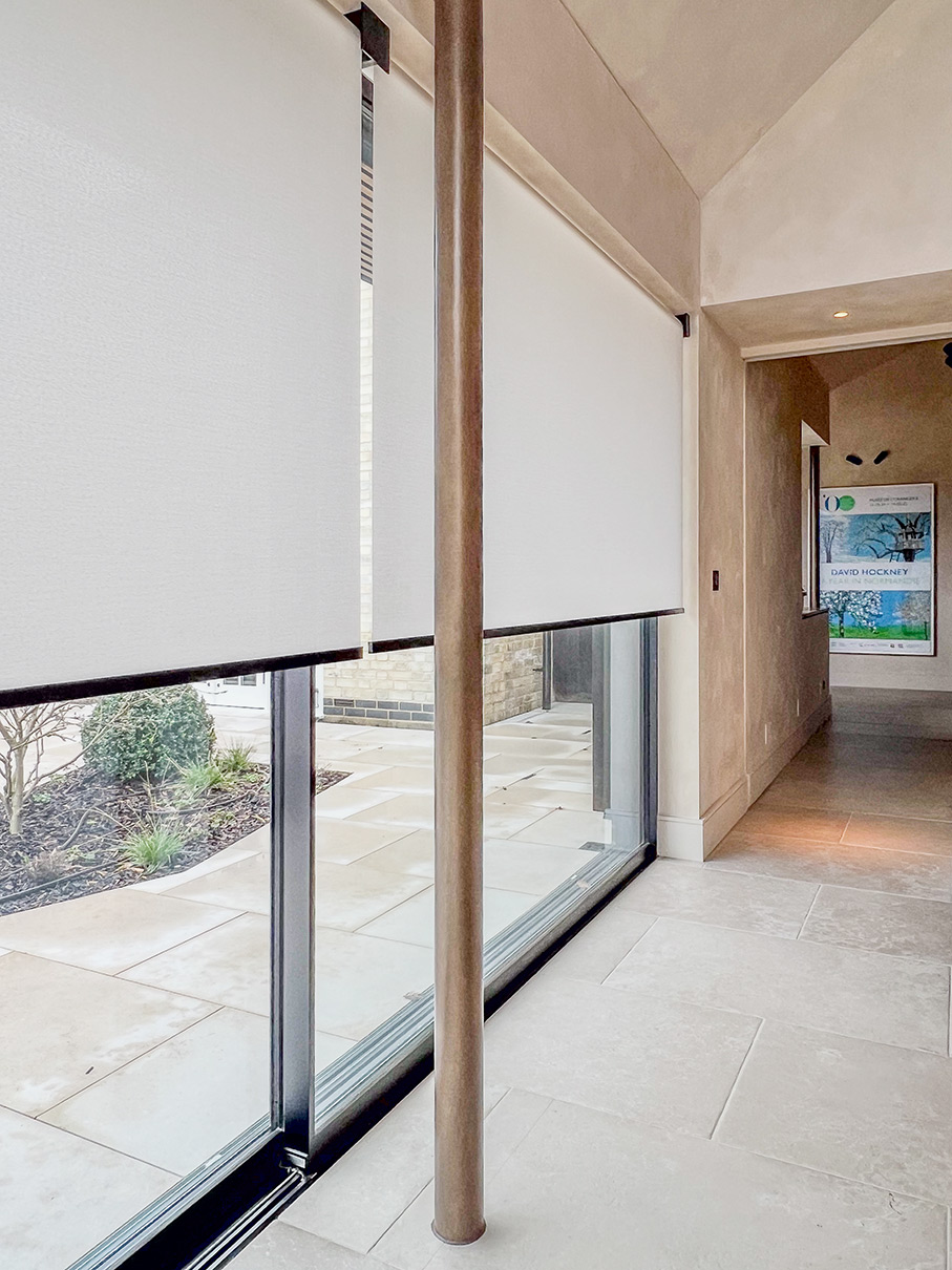 Modern blinds installed to multiple large maxlight sliding doors